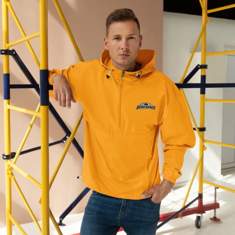 Gold packable jacket with the Imperial Sand Dunes chest wordmark